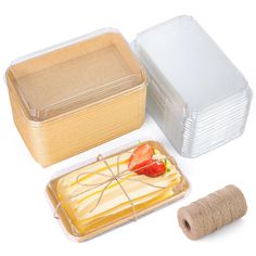 there are three containers with food in them and one has a roll of twine