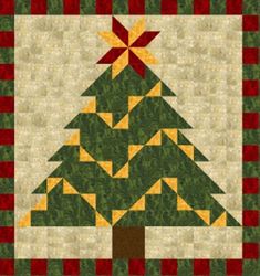 a quilted christmas tree with red, yellow and green stripes on the bottom half