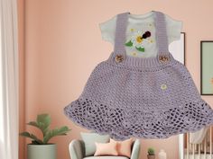 This is a beautiful Crochet baby outfit for 0-3 months. The outfit consists of a bodysuit and a garden skirt The bodysuit was added to a large flower, four small flower ones, and a ladybug in crochet two wooden buttons added to the garden skirt. The outfit is made using a wonderful and very soft acrylic baby yarn. Fantastic for any occasion. Hand wash, shape, and air dry. All my items come from a smoke-free and pet-free environment.  Ready for a gift. Great for a Baby Shower.     IMPORTANT: Please note that my handmade crochet or knit garments are laid out flat in most cases for the measurements. Most measurements are prior to stretch, so you can expect the garment to give a little bit if needed. An example of the garment giving would be for pulling the garment over the child's head Rememb Crochet Bodysuit, Knit Garments, Crochet Outfit, Crocheted Dress, Newborn Bodysuit, Baby D, Crochet Baby Clothes, Dress Crochet, Outfit Dress