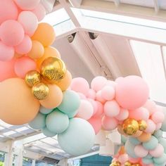 some balloons are hanging from the ceiling