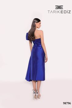 Tarik Ediz 98796 Fall 2024 evening collection dress. Made with Tafetta fabric. Fitted Pre-draped Gala Dress, Fitted A-line One Shoulder Dress For Formal Occasions, Pre-draped One Shoulder Evening Dress For Gala, One Shoulder Pre-draped Satin Party Dress, Luxury A-line Midi Dress For Party, Silk A-line Evening Dress For Gala, Chic Silk Dress For Gala, Pre-draped Floor-length Silk Evening Dress, Formal One-shoulder Satin Dress With Fitted Bodice