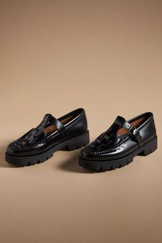 G.H. Bass Fisherman Mary Jane Flats | Anthropologie Black Monk Strap Shoes With Textured Sole, Monk Strap Shoes With Textured Sole For Work, Slip-on Dress Shoes With Leather Footbed And Round Toe, Leather Footbed Slip-on Dress Shoes With Round Toe, Slip-on Loafers With Vibram Sole, Slip-on Oxfords With Rubber Sole And Round Toe, Leather Slip-on Shoes With Vibram Sole For Work, Slip-on Round Toe Oxfords With Stitched Sole, Vintage Leather Shoes With Textured Sole And Closed Toe