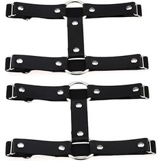 three black leather restraints with metal rings on each side and one has two holes in the middle