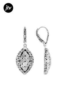 Elevate your style with these exquisite Sterling Silver Woven Dangle Earrings from our Artisan Collection of Bali���. Crafted using the intricate Oxidized Finishing Technique, each piece showcases a unique blend of elegance and artistry. The delicate design measures 1.58 inches in length and 0.59 inches in width, making them an ideal statement accessory for any occasion.  These stunning earrings feature a secure lever back closure type that ensures they stay comfortably on your ears all day long Elegant Artistic Drop Earrings Jewelry, Elegant Oval Earrings With Intricate Design, Elegant Metal Jewelry With Artistic Design, Elegant Artistic Drop Earrings, Elegant Artistic Design Drop Earrings, Elegant Sterling Silver Jewelry With Artistic Design, Elegant Filigree Metal Clip-on Earrings, Elegant Metal Filigree Clip-on Earrings, Formal Filigree Clip-on Earrings