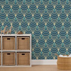 a blue and gold wallpaper with an art deco style pattern on the back ground