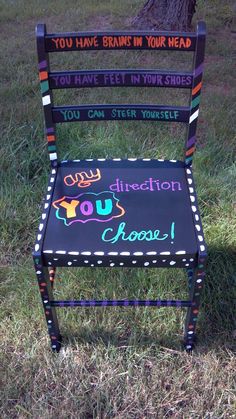 an old chair painted with the words you have brain in your head, you have feet in your shoes and you can steer yourself