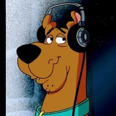 a cartoon dog wearing headphones and listening to music