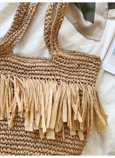 Large straw woven tote bag with fringes perfect for all occasions.Size approximately 47cm wide x 40cm tall. (18in x 16in) Designer Style ID: 8275 Large Straw Woven Tote Bag, Summer Bag, Everyday Shoulder Bag, Beach Bag Chic Beige Fringe Shoulder Bag, Summer Beige Bags With Tassels, Beige Tassel Bag For Beach, Beige Tassel Bag For The Beach, Beige Tassel Beach Bag, Chic Beige Fringe Bag, Chic Straw Beach Bag With Tassels, Chic Beach Straw Bag With Tassels, Summer Rectangular Shoulder Bag With Fringe