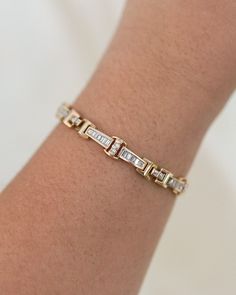 * Bracelet Material: Diamond, 14K Yellow Gold * Bracelet Width: 8-2.6 mm width * Stone Weight & sizes: 130 Diamonds - 3.25ct, IJ Color, SI Clarity * Overall weight: 21.2g * Bracelet material: 14k yellow gold * Bracelet length: 7.5 inch Luxury Round Tennis Bracelet With Baguette Diamonds, Timeless Tennis Bracelet With Baguette Diamonds, Timeless Baguette Diamond Bracelet For Formal Occasions, Classic Baguette Bracelet With Diamond Accents, Classic Baguette Diamond Accent Bracelets, Classic Baguette Diamond Bracelet, Classic Baguette Bracelets For Anniversary, Timeless Round Bracelets With Baguette Diamonds, Baguette Diamond Bracelet In Yellow Gold