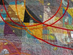 a close up view of an abstract quilt