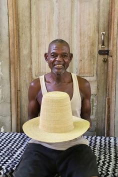 Handwoven Hat - Fair Trade The Gandalf - The higher the hat the closer to heaven. An ode to Gandalf himself and Alejandro Jodorowsky’s towering Holy Mountain versions... the “Gandalf” has been handwoven for those of you who are fanatical about hats. Know about the magic in hats and will wear hats everywhere they go because they know... that hats are most definitely where it’s at. The weaver of this Baba Tree product will receive a 5% commission on the retail price in addition to what they were p Gandalf Hat, Tree Basket, Holy Mountain, African Hats, Woven Hat, The Weaver, Hat Handmade, African Baskets, Gandalf