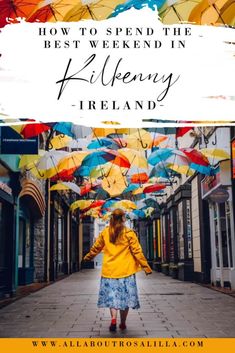 a woman walking down an alley way with umbrellas in the background and text overlay that reads how to spend the best weekend in kileenny ireland