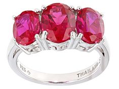 5.04ctw oval lab created ruby rhodium over sterling silver 3-stone ring. Measures approximately 3/8"L x 1/16"W. Not sizeable. Ruby Ring Designs, Red Lab, Mens Gemstone Rings, 3 Stone Rings, Discount Jewelry, Diamond Simulant, Red Gemstones, Gold Band Ring, Jewelry Online Shopping