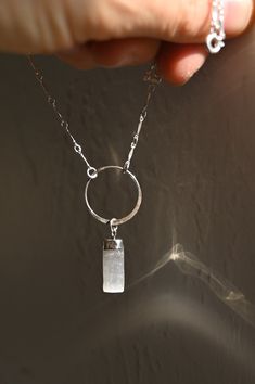 A beautiful, soft necklace that is both unique and simply stated. Wear this necklace and know you have a selenite stone right near your heart and throat Chakras, amplifying their energies! A daily reminder that you are the Lightbringer of your own life. Selenite is known for its cleansing and protective properties, helping to clear negative energy and promote clarity and peace. Wearing this necklace not only enhances your look but also invites a calming, grounding energy into your life Selenite Soft Necklace, Selenite Necklace, Selenite Stone, Chakra Gifts, Spiritual Necklace, Grounding Energy, Clear Negative Energy, Angel Aura Quartz, Crystal Suncatchers