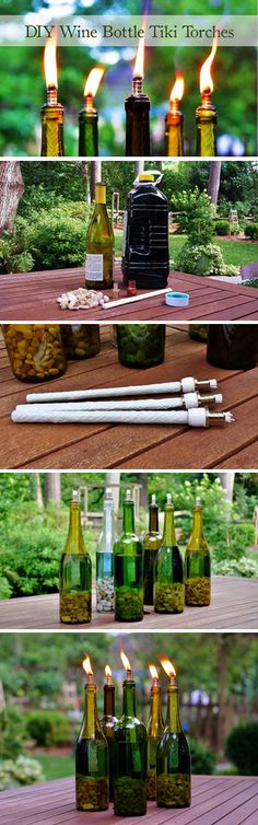 several bottles with candles in them sitting on a table