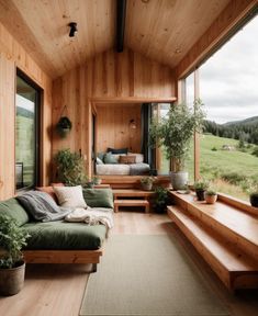 a living room filled with furniture and lots of windows