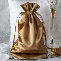 "View All Colors: https://etsy.me/3Z1JIbC Quantity: 12 Satin Bags Material: Satin Color: Antique Gold Bag Size: 6\" x 9\" Fillable Size: 6\" x 7.5\" Perfect for packaging jewelry or candies. Satin style with shiny finish. Does not have a flat bottom. Drawstring Pouch These satin party favor bags have a glamorous gloss that is so eye-catching; just fill these candy bags with delectable favors like chocolates, candies, nuts or sweet knick-knacks for the delight of your guests. You can even use the Wedding Party Gift Bags, Wedding Favor Gift Bags, Handmade Wedding Favours, Handmade Candy, Wedding Gift Bags, Wedding Favor Bags, Satin Bags, Gold Bag, Party Gift Bags