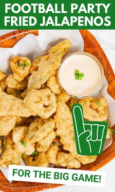 a bowl filled with fried jalapenos on top of a table