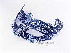 "Navy Blue Masquerade Mask Women, Venetian Mask, Mardi Gras RHINESTONES S H I P P I N G - Last minute Masquerade Mask shopping? Processed same day or within 24 hours. 1-2 day guaranteed delivery services offered, add items to cart and click on shipping tab for rates. Pls leave a check out note with your need date & contact number (especially for expedited and custom orders) Msg for delivery time frames (Include your state/country). I N C L U D E D Mask comes with matching ribbons S I Z E 12\" le Blue Masquerade Mask, Masquerade Mask Women, Elegant Face Mask, Masked Ball, Female Mask, Bride Headband, Blue Mask, Filigree Pattern, Venetian Mask