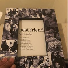 a person holding up a photo frame with the words best friend on it in front of them