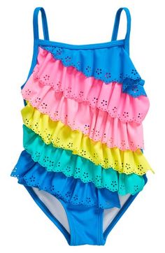 Your kiddo will love every pool day splashing around in this cute one-piece swimsuit featuring rainbow-colored ruffles with eyelet and scalloped details. Pull-on style Lined 82% nylon, 18% elastane Machine wash, line dry Imported Playful Ruffled Swimwear For Summer, Multicolor Spring One-piece Swimwear, Playful Pink Ruffled Swimwear, Beach Season Ruffled Swimwear, Summer Swimwear With Ruffles, Cute Ruffled Swimwear For Poolside, Cute Ruffled Swimwear For Vacation, Pink Ruffled One-piece Swimsuit For The Beach, Pink Ruffled One-piece Swimwear For Beach