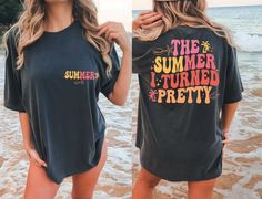 two women standing on the beach wearing matching t - shirts that say summer is turned pretty