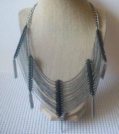 Vintage Necklace Stamped Steve Madden Fringe Silver Black 24" Long 81116 Signed Steve Madden on little Jewelry tag Metal in silver tones and black Metal bejeweled Bar Dividers Never worn like new Nickel Free Black Necklace For Party, Black Jewelry With Silver Chain For Party, Party Black Jewelry With Silver Chain, Adjustable Black Jewelry With Silver Chain, Black Jewelry With Adjustable Silver Chain, Black Necklace With Silver Chain, Black Metal Jewelry With Silver Chain, Black Metal Chain Necklace With Silver Chain, Nickel-free Black Necklace For Party