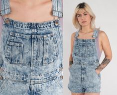 "Vintage 80s 90s jean overalls shorts in acid wash blue denim with a raw hem. Please see measurements and condition below. Every garment we sell is authentic vintage and one-of-a-kind! You will receive the exact item photographed. Condition: Very good vintage. Best fits women's: Labelled Small Tag: Faded Glory Material:  Cotton MEASUREMENTS Taken from seam to seam while the garment is lying flat. Double the armpit, waist, and hips For reference, model is 5'7\" and measures 32-26-38. Length from Trendy Washed Denim Shortalls, High Rise Medium Wash Shortalls For Summer, Medium Wash Short Overalls For Summer, Summer High Rise Washed Denim Jumpsuit, Trendy Denim Shortalls With Frayed Hem, Summer Cutoff Overalls With Pockets, Spring High Rise Medium Wash Shortalls, Summer Medium Wash Short Length Overalls, Spring High-rise Medium Wash Shortalls