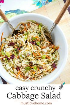 cabbage salad with carrots and cranberries in a white bowl