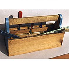 an open tool box with tools in it