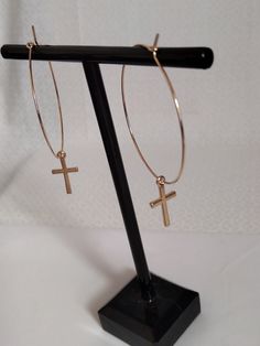 Handcrafted Gold Cross hoop Earrings 1 1/2 inch hoops with a dainty cross Gold plated hoops, nickel free, hypoallergenic  lightweight, religious cross jewelry Cross charms measures: 10mm width 15mm length These lovely earrings are perfect for daily wear or give as a gift for birthday, anniversary, Christmas holiday, Valentine's Day and more. JEWL 759 You can see more of my created jewelry at https://www.etsy.com/shop/amazingdisctboutique If you have any questions please message me  Surprise incl Metal Hoop Plug Earrings With Ear Wire, Adjustable Pierced Hoop Earrings, Earrings Cross, Cross Gold, Jewelry Cross, Religious Cross, Hoop Earrings Gold, Handcrafted Artisan Jewelry, Cross Earrings