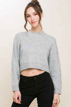 Elevate your winter wardrobe with our Wool Blend Cropped Sweater Top, a perfect blend of comfort and style. Crafted from a cozy wool blend, this sweater top offers a luxurious feel and warmth. The cropped silhouette adds a modern touch, making it a versatile piece for pairing with high-waisted bottoms. Style: Cozy Print / Pattern: Wool Blend Silhouette: Sweater Fit: Oversized Embellishment: Wool Blend Neck Line: Round Sleeve: Long Sleeve Length: Cropped Closure: Pullover Lining: No Fabric Conten