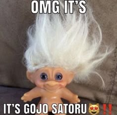 there is a troll doll with white hair on it's head and the caption omg it's it's go satrou