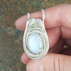 "You want it and you know who you are. This Rainbow Moonstone pendant is wire wrapped in sterling silver. Moonstone holds within it the deep seated nature of feminine energy, which is said to help balance the masculine-feminine vibrations within your body and nurture your spirit. I'm offering this amazing piece together including chain for only 250. 📖 A 𝗹𝗲𝗴𝗲𝗻𝗱 𝗳𝗿𝗼𝗺 𝗦𝗿𝗶 𝗟𝗮𝗻𝗸𝗮 says that a moon like stone occurred deep in the earth, and that on a night like this when the moon was Deer Antler Jewelry, Deer Jewelry, March Birthstone Necklace, Antler Jewelry, Gold Disc Necklace, Antler Necklace, Moon Phases Necklace, Masculine Feminine, Lovers Necklace