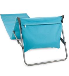 a blue beach chair sitting on top of a white floor