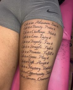 a woman's thigh with writing on it