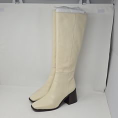 Sam Edelman Wade Knee High Block Heel Modern Ivory Color Boots Brand New Without Box Partial Zip Side 3.5" Heel Some Scuffs From Pallet See Pictures For Reference. You Have A Question Don't Hesitate To Ask. Cream Wide Calf Pointed Toe Boots, Cream Leather Boots With Almond Toe, Cream Fitted Almond Toe Boots, Classic Cream Boots For Formal Occasions, Cream Almond Toe Fitted Boots, Formal Cream Leather Boots, Cream Leather Heels With Square Toe, Cream Leather Square Toe Heels, Cream Leather Square-toe Heels