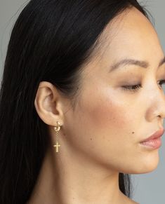 This hoop cross earring is made of solid gold and features a 9.5mm long chain, finished with signature Rockford screw designs. Elevate any look with this premium dangle cross earring. Mens Cross Earrings, Gold Cross Earrings Men, Hanging Cross Earrings Men, Yellow Gold Cross Earrings For Pierced Ears, Gold Cross-shaped Pierced Earrings, Nickel-free Gold Cross Earrings, Dangle Cross Earrings, Pinky Signet Ring, Black Diamond Bands