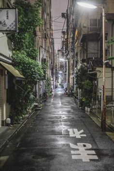 an empty city street at night with no people