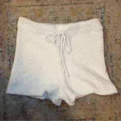 So Cute For A Slumber Party Or Bridal Pajamas! These Are Very Fun Fuzzy White Pajama Shorts With A Fuzzy Drawstring. They’re High Rise Bootie Shorts And Are So Soft!! Waist: 13in Hips: 15.5in Rise: 11in Inseam: 2.5in White Super Soft Casual Sleepwear, Casual Super Soft White Sleepwear, Casual White Super Soft Sleepwear, Cozy Pajama Shorts For Pajama Party, Fitted White Bottoms For Pajama Party, White Soft Sleepwear For Lounging, White Soft Textured Bottoms For Lounging, White Soft Textured Sleepwear For Lounging, White Soft Texture Sleepwear For Lounging