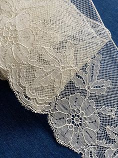 This beautiful lace has the look of Carrickmacross with its densely woven fillings outlined with cord on a net ground. Lace has floral motifs, lace fillings and a scalloped border with picot edges. Lace measures 5 inches in width. Excellent unused, antique condition. Very scant light patina in a few places. 100% cotton. Sold by the yard. Spring Cotton Lace With Lace Work, Vintage Beige Scalloped Lace, Cream Lace With Lace Trim For Spring, Spring Vintage Crochet Lace, Cream Lace With Lace Work For Spring, Lace Hat, Scalloped Border, Script Monogram, Net Lace