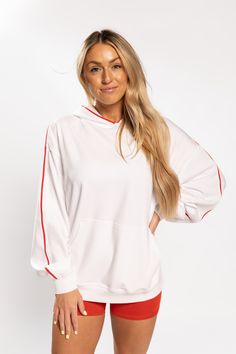 The Resort Hoodie is perfect for breezy beach evenings or chilly mornings. With its relaxed fit and cozy details, it goes beyond summer days and transitions easily to cold weather seasons. Whether you're lounging by the fire, taking a sunset stroll, or just needing an extra layer on a cool night, this hoodie has got you covered. FIT & FABRIC: Piping & pop color details for a summertime vibe. Lightweight 4-season fabric, perfect for summer nights. Graphic on wear’s back. Kangaroo pocket. Oversize Cozy Hoodie With Ribbed Cuffs For Lounging, Comfortable Sweatshirt With Adjustable Hood For Loungewear, Fall Hoodie With Kangaroo Pocket For Lounging, Fall Lounging Hoodie With Drawstring Hood, Lounging Hoodie Sweatshirt With Drawstring Hood, Winter Athleisure Hoodie For Lounging, Cozy Fit Athleisure Hoodie For Lounging, Athleisure Hoodie With Ribbed Cuffs For Lounging, Cozy Hoodie With Drawstring For Lounging