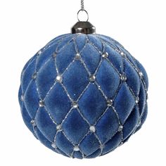 a blue ball ornament hanging from a chain