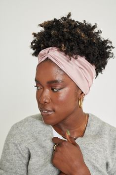 Wrap it and love it. What it is: A stylish all-satin wrap headband with an extra wide back to protect your updos and delicate edges. Why it's special: all-satin construction - ready-to-wear twist design non-absorbing fabric redistributes hair's natural oils for healthier curls gentle on your delicate edges wide back protects your hair against headrests Good to know: Machine wash cold and tumble dry on low. 96% Polyester 4% Spandex Headwrap Hairstyles, Wrap Headband, Roller Skaters, Natural Hair Oils, Black Hair Care, Hair Wraps, Natural Oils, Wrap Style, Love It