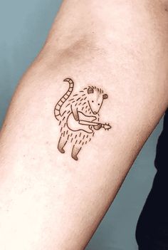 a person with a small tattoo on their arm