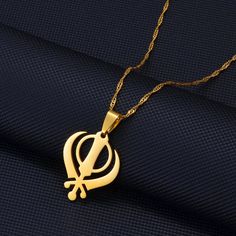 Elevate your heritage with our Sikhism Khanda Symbol Necklace. Show your pride, support your country & wear your pendant with passion. Buy now! Khanda Necklace, Locket Design, Pride Support, Big Rangoli Designs, Unique Pendant Necklace, Country Wear, Symbol Necklace, Black Beaded Jewelry, Fancy Jewelry