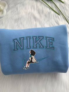 The Nike SZA With Nike Shoes Embroidered Crewneck T-Shirt is the perfect blend of style and comfort for both men Nike Clothes, Preppy Decal, Hawaiian Shirt Women, Cartoon Shirts, Cartoon Sweatshirts, Street Fashion Men Streetwear, Embroidered Crewneck, Sweatshirt For Men, Shoe Gifts