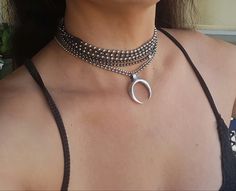 "♦ A multi chains necklace, made of a silver mix with gray black-plated brass in very high quality with a Crescent moon pendant in its center. SIZE Length: 15.8\" (40cm) up to 17.7\"(45cm) (The size refers to the bottom chain) pendant height: 1.57\"(4cm) Pendant width: 1.57\"(4cm) ♦ This piece of jewelry is perfect as a gift for yourself, for a wedding day, Valentine's day or a birthday. If you're interested in sending a gift to a third party, just write your message to the recipient and I will Silver Multi-strand Choker As Gift, Double Horn Necklace, Horn Pendant Necklace, Choker Silver, Multi Chain Necklace, Crescent Necklace, Diy Jewelry Inspiration, Necklace Layered, Horn Necklace