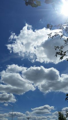 the sun shines brightly through some clouds