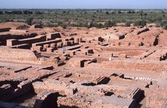 an aerial view of the ruins of a village